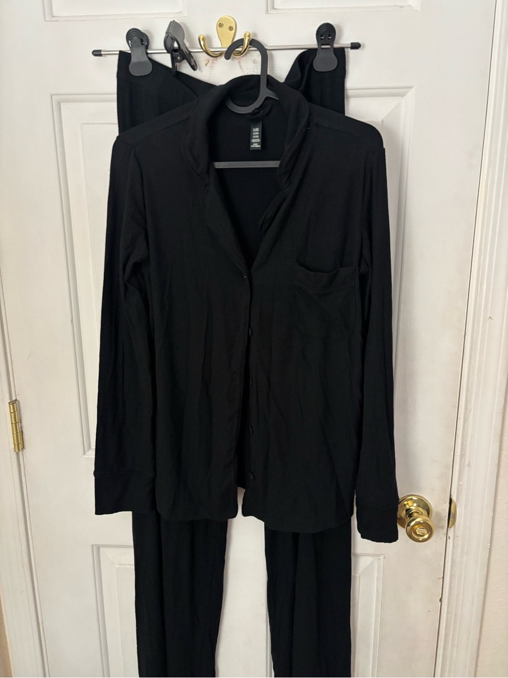 SKIMS Black pants size medium and shirt size extra small